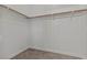 Spacious walk-in closet featuring ample storage and shelving for organization at 2596 Lazy Saddle Dr, Henderson, NV 89002