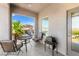 Inviting balcony with a grill and seating, perfect for enjoying the outdoors and beautiful neighborhood views at 295 Callen Falls Ave # 2225, Henderson, NV 89011