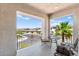 Relaxing balcony with outdoor seating and a scenic view of the neighborhood at 295 Callen Falls Ave # 2225, Henderson, NV 89011