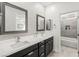 Bathroom featuring a dual sink vanity and a tub shower with gray tile surround at 295 Callen Falls Ave # 2225, Henderson, NV 89011