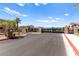 Gated community entrance featuring brick pillars, black iron gates and landscaping at 295 Callen Falls Ave # 2225, Henderson, NV 89011