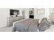 Well-appointed main bedroom with a king bed, dresser, and views of an ensuite bathroom, designed for relaxation at 295 Callen Falls Ave # 2225, Henderson, NV 89011