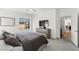 Comfortable main bedroom with a ceiling fan, sleek furnishings, and views of the neighborhood from the window at 295 Callen Falls Ave # 2225, Henderson, NV 89011