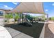 Community playground featuring modern equipment with shade structure and landscaping at 295 Callen Falls Ave # 2225, Henderson, NV 89011