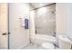 Contemporary bathroom featuring a marble tiled shower and modern fixtures at 3028 Treesdale Dr, Las Vegas, NV 89134