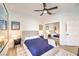 Well-lit bedroom featuring a mirrored closet and Disney art at 3028 Treesdale Dr, Las Vegas, NV 89134