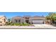 Stunning single-story home with well-manicured landscaping and a spacious three-car garage at 3028 Treesdale Dr, Las Vegas, NV 89134