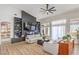Bright living room features modern built-ins, a cozy fireplace, and ample natural light at 3028 Treesdale Dr, Las Vegas, NV 89134