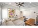 Bright office space with neutral decor, modern ceiling fan, and Alice in Wonderland art at 3028 Treesdale Dr, Las Vegas, NV 89134