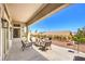 Inviting covered patio with comfortable seating and scenic views at 3028 Treesdale Dr, Las Vegas, NV 89134