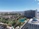 Expansive aerial view of lush golf course and a modern resort hotel at 322 Karen Ave # 2606, Las Vegas, NV 89109