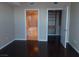 Bedroom with ensuite bathroom and walk-in closet; dark hardwood floors at 322 Karen Ave # 2606, Las Vegas, NV 89109
