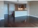 Bright living area with hardwood floors, leading to an open kitchen at 322 Karen Ave # 2606, Las Vegas, NV 89109