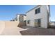 This backyard has brick walls on the side, gravel, and sliding doors to the house at 336 Taylor St, Henderson, NV 89015