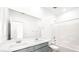 This bathroom has double sinks, a large mirror and a tiled shower and bathtub combo at 336 Taylor St, Henderson, NV 89015