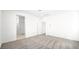Large bedroom featuring plush gray carpeting, access to a bathroom, and a closet at 336 Taylor St, Henderson, NV 89015