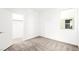 Bright bedroom with neutral carpet, white walls, a closet, and a sunlit window at 336 Taylor St, Henderson, NV 89015