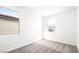 This bedroom has neutral paint, carpeted floors and two bright windows to let in the sunlight at 336 Taylor St, Henderson, NV 89015