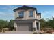 Charming two-story home showcasing a well-kept yard and an attached two-car garage at 336 Taylor St, Henderson, NV 89015
