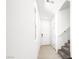 Inviting hallway features wood-look flooring, neutral walls, and staircase access at 336 Taylor St, Henderson, NV 89015
