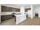 Well-equipped kitchen featuring a large island, modern appliances, quartz countertops, and stylish cabinetry at 336 Taylor St, Henderson, NV 89015