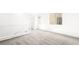 Cozy loft features soft gray carpeting, a staircase, and abundant natural light at 336 Taylor St, Henderson, NV 89015