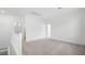 This loft has plush carpet and white walls and trim at 336 Taylor St, Henderson, NV 89015
