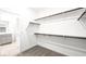 Spacious walk-in closet with ample shelving and convenient access to the bathroom at 336 Taylor St, Henderson, NV 89015