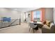 A stylish bonus room with a seating nook, large window, and decorative shelving at 338 Taylor St, Henderson, NV 89015