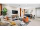 Spacious living room with contemporary decor and a dining area, perfect for entertaining at 338 Taylor St, Henderson, NV 89015