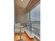 Cozy balcony with white bar stools, a sleek bar, and amazing cityscape views at 3750 S Las Vegas Blvd # 3111, Las Vegas, NV 89158