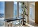 Home office space showcasing large windows with city views and a modern desk at 3750 S Las Vegas Blvd # 3111, Las Vegas, NV 89158