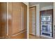 Modern kitchen features sleek wood cabinetry, stainless steel oven and microwave combination at 3750 S Las Vegas Blvd # 3111, Las Vegas, NV 89158
