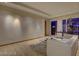 Bright living room with hardwood floors, a comfortable sofa, and floor to ceiling windows with a city view at 3750 S Las Vegas Blvd # 3111, Las Vegas, NV 89158