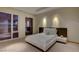 Sleek bedroom featuring modern decor, floor to ceiling windows, and city views at 3750 S Las Vegas Blvd # 3111, Las Vegas, NV 89158