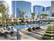 Luxury pool area with lounge chairs, umbrellas, and city views from this opulent resort-style space at 3750 S Las Vegas Blvd # 3111, Las Vegas, NV 89158