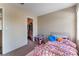 Cozy bedroom with window, carpet, and closet offers a comfortable retreat at 3950 S Sandhill Rd # 130, Las Vegas, NV 89121