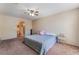 Cozy bedroom with carpet flooring, ceiling fan and bathroom access offers comfortable living at 3950 S Sandhill Rd # 130, Las Vegas, NV 89121