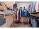 Walk-in closet offering ample storage space with shelving and hanging racks for organization at 3950 S Sandhill Rd # 130, Las Vegas, NV 89121