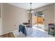 Casual dining space with tile flooring, natural light, and a view of the backyard at 3950 S Sandhill Rd # 130, Las Vegas, NV 89121