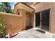 Outdoor patio area with space for seating and a sliding glass door at 3950 S Sandhill Rd # 130, Las Vegas, NV 89121