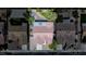 Aerial view of the home showcasing the red tile roof, backyard, and the surrounding neighborhood at 401 Obsidian St, Las Vegas, NV 89145