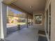 Enjoy the outdoors on this large covered patio with shade screens and view to landscaped backyard at 401 Obsidian St, Las Vegas, NV 89145
