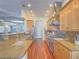 Gourmet kitchen with stainless steel appliances, wood cabinets and granite countertops at 401 Obsidian St, Las Vegas, NV 89145
