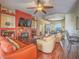 Spacious living room features ceiling fan, fireplace, hardwood floors, and comfortable seating at 401 Obsidian St, Las Vegas, NV 89145
