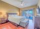Serene main bedroom with natural light, hardwood floors, and access to a private outdoor area at 401 Obsidian St, Las Vegas, NV 89145