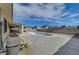 Backyard has a covered patio, a filtration system and an empty in-ground pool at 4067 E Colorado Ave, Las Vegas, NV 89104