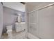 A basic bathroom with a shower, vanity, tile floors, and a toilet at 4067 E Colorado Ave, Las Vegas, NV 89104