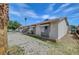 Charming single-story home with a gravel yard and mature palm trees at 4067 E Colorado Ave, Las Vegas, NV 89104