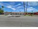 Charming single-story home with a gravel yard and mature palm trees at 4067 E Colorado Ave, Las Vegas, NV 89104